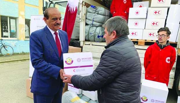 Qatar's ambassador to Albania, Ali bin Hamad al-Marri leads distribution of relief materials