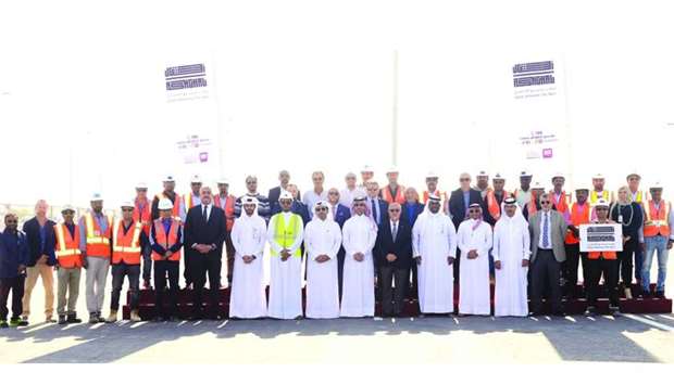 Ashghal officials and contracting company engineers attending the opening of carriageway of East Industrial Street Extension Project Saturday. PICTURE: Shaji Kayamkulam.