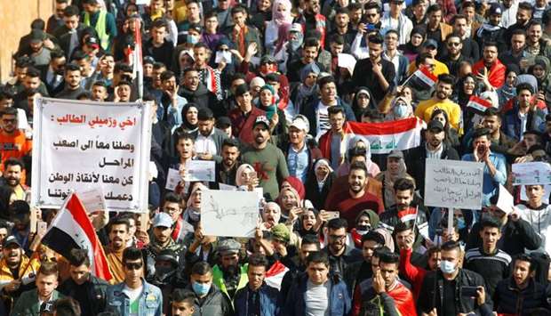 Iraqi University students gather during ongoing anti-government protests in Baghdad, Iraq