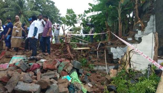 The six-metre high wall crumbled at around 5:30 in the morning. Photo courtesy: Deccan Herald