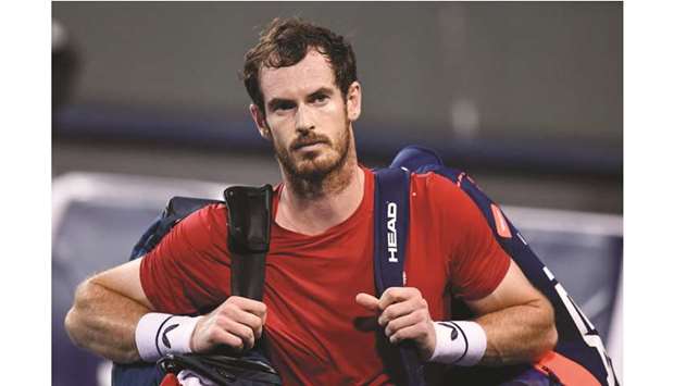 In this file photo, Andy Murray of Britain leaves the court after losing against Fabio Fognini of Italy in their match at the Shanghai Masters in Shanghai on October 8, 2019. (AFP)
