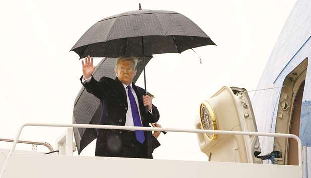 President Donald Trump boards Air force One as he departs Washington for travel to the UK at Joint Base Andrews, Maryland, US, yesterday.