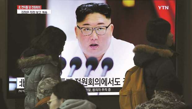 People watch a television news programme showing the latest pictures of North Korean leader Kim Jong-un, at a railway station in Seoul yesterday.