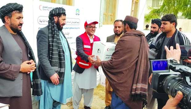 QRCS officials delivering aid in Afghanistan.rnrn