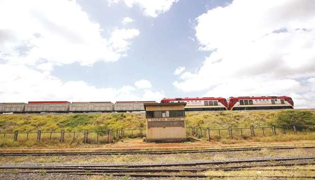 A Standard Gauge Railway (SGR) cargo train transferring containers near the town of Sultan Hamud, Kenya.