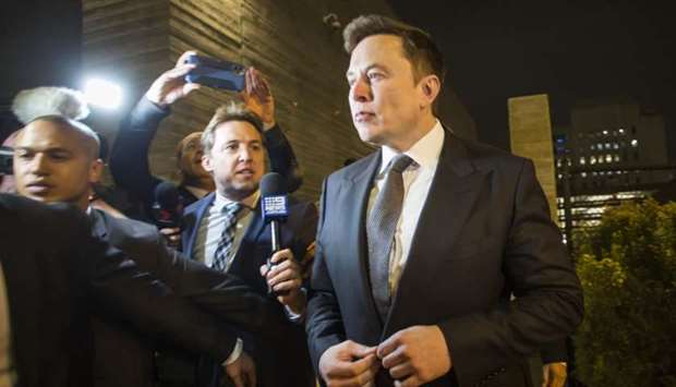 Elon Musk, chief executive officer of Tesla Inc. leaves the US District Court, Central District of California through a back door in Los Angeles