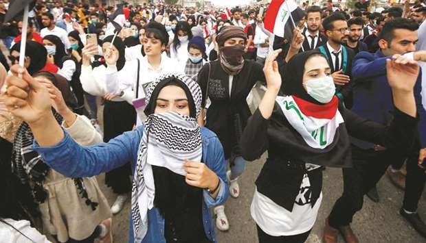 University and college students attend the ongoing anti-government protests in Basra, yesterday.