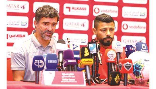Bahrain coach Helio Sousa (left) address a press conference on the eve of their 24th Arabian Gulf Cup semi-final against Iraq in Doha. (Right) Iraq coach Srecko Katanec talks to the media yesterday.