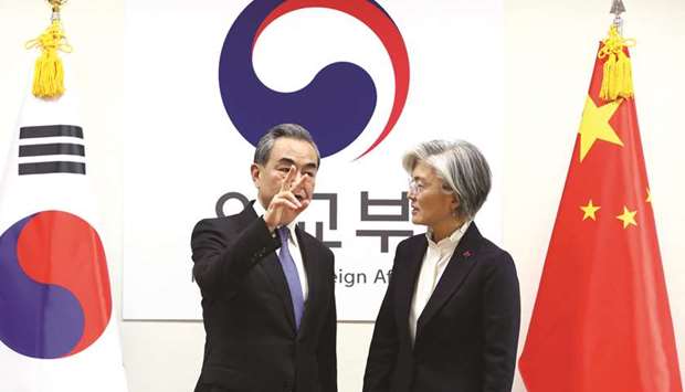 South Koreau2019s Foreign Minister Kang Kyung-wha with Chinese Foreign Minister Wang Yi  during their meeting at foreign ministry in Seoul yesterday.