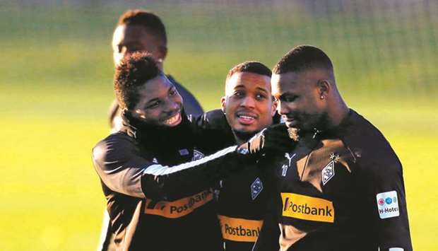 (From left) Borussia Moenchengladbachu2019s players Breel Embolo, Alassane Plea and Marcus Thuram take part in a training session in Moenchengladbach, Germany, on Wednesday. (AFP)