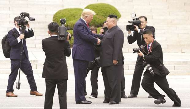 US President Donald Trump meets with North Korean leader Kim Jong-un at the demilitarised zone separating the two Koreas, in Panmunjom, South Korea, earlier this year.
