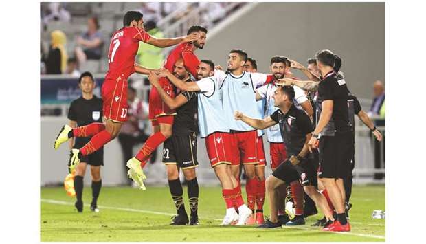 Bahrain players celebrate their win over Iraq in the semi-final against Iraq on Thursday. PICTURE: Anas Khalid