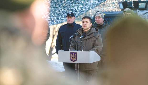 This handout picture released by the Ukrainian presidential press service shows Zelenskiy addressing servicemen during his visit to the Donetsk region.