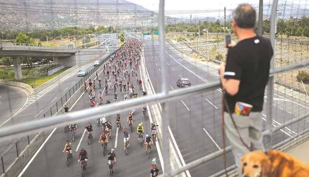 This picture taken last weekend shows demonstrators riding their bicycles in Santiago.