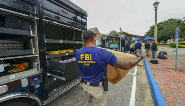FBI Evidence Response Team after a shooting incident at a naval base in Pensacola, Florida. AFP/FBI