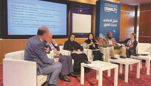 HBKU faculty at a panel discussion.