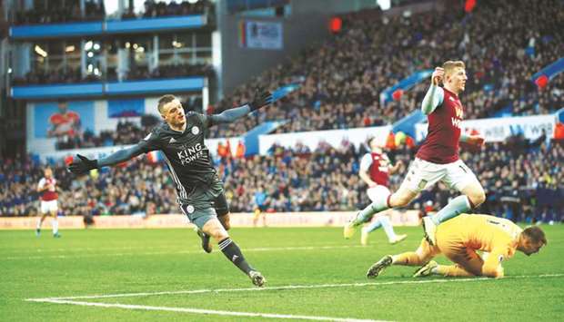 Leicester Cityu2019s Jamie Vardy (left) celebrates after scoring a goal during the EPL match against Aston Villa in Birmingham, United Kingdom, yesterday. (Reuters)