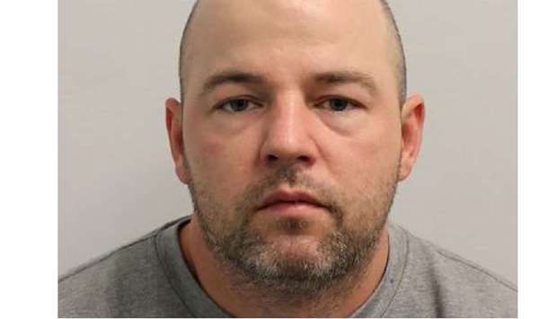 A handout photograph released by the Metropolitan Police on December 9, 2019 shows Joseph McCann for his custody photograph in London