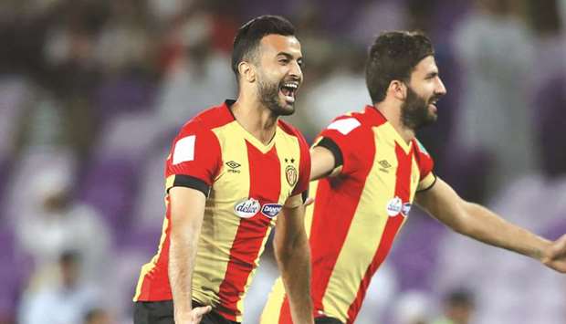 Taha Yassine Khenissi (left) taking part in his third FIFA Club World Cup.
