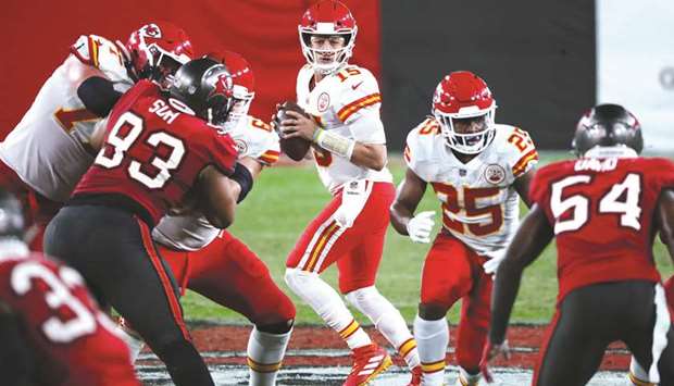 Kansas City Chiefs quarterback Patrick Mahomes (centre) drops back to pass against the Tampa Bay Buccaneers in Tampa, Florida, United States, on Sunday. (USA TODAY Sports)