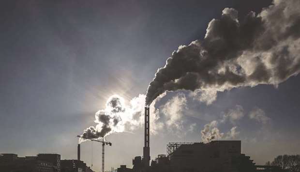 Smoke rises from the chimneys of a waste incineration plant in Saint-Ouen on the outskirts of the French capital Paris (file). Carbon futures have risen steadily this year as policy makers flagged plans to bolster the worldu2019s most extensive programme to slash fossil-fuel pollution.