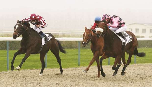 Olivier Peslier (left) rides Fayona to Prix de Pru00e9aux victory in Deauville, France, yesterday. (Scoopdyga)