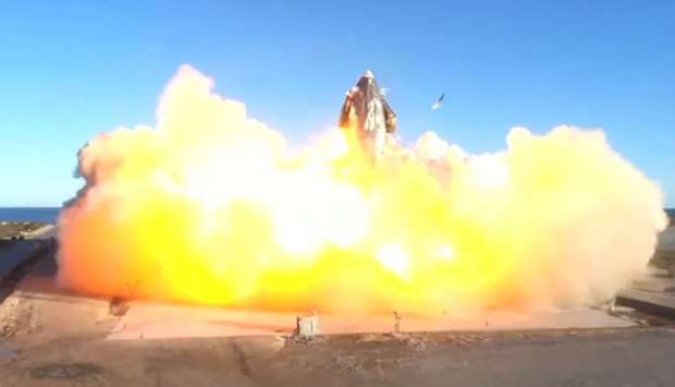 This SpaceX video frame grab image shows SpaceX's Starship SN8 rocket prototype crashing on landing at the company's Boca Chica, Texas facility during an attempted high-altitude launch test