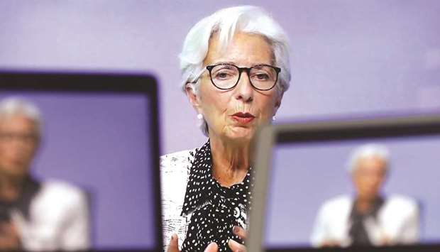 ECB president Christine Lagarde speaks during a live stream video of the central banku2019s virtual rate decision news conference in Frankfurt (file). Lagarde yesterday said it would likely take until early 2022 for the economic recovery to take root, assuming that scientists are right in saying vaccines will have given the world u201csufficient herd immunityu201d by the end of next year.