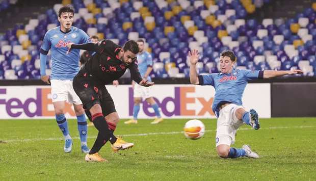 Real Sociedadu2019s Willian Jose (centre) scores against Napoli during the Europa League Group F match at the Stadio Diego Armando Maradona in Naples, Italy, on Thursday night. (Reuters)
