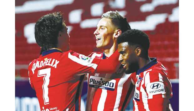 Atletico Madrid lead La Liga by a single point from the seasonu2019s surprise package Real Sociedad. (Reuters)