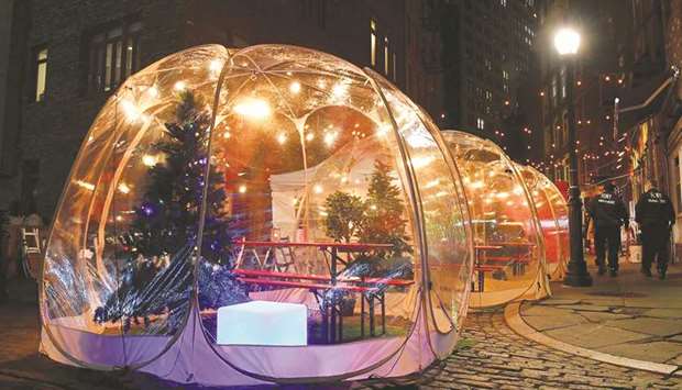 Social distancing bubble tents for dining are seen amid the coronavirus pandemic in New York City.