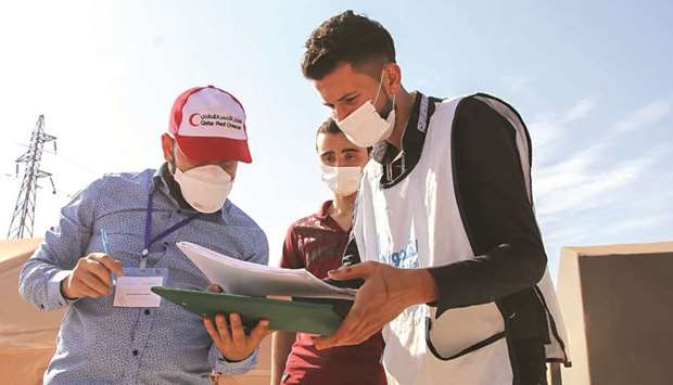 QRCS personnel monitoring the polio vaccination campaign in northern Syria.rnrn