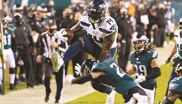 Seattle Seahawks wide receiver D K Metcalf (top) attempts to leap over Philadelphia Eagles cornerback Darius Slay during the second quarter of the NFL game at Lincoln Financial Field in Philadelphia, Pennsylvania, United States, on Monday. (USA TODAY Sports)
