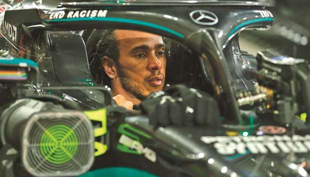 Mercedes driver Lewis Hamilton is pictured in his car after winning the Bahrain Grand Prix on Sunday. (AFP)