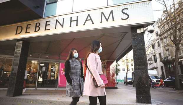 People walk past a Debenhams store on Oxford street in London. Administrators FRP Advisory said yesterday that Debenhams would be wound down after it failed to find a buyer.