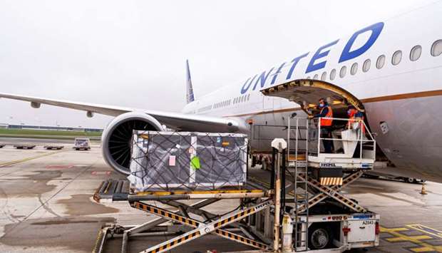 A shipment of Pfizer's coronavirus disease vaccines is unloaded from a United Airlines cargo-only flight from Brussels to O'Hare International Airport in Chicago, Illinois, US on December 2.