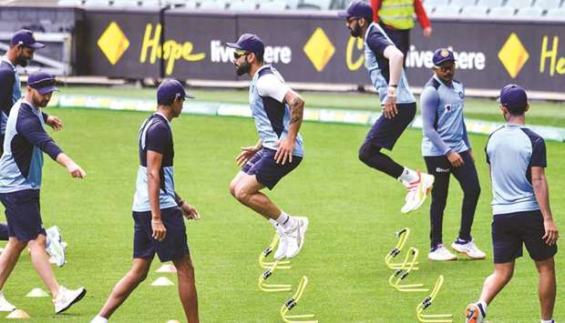 Indiau2019s captain Virat Kohli (C) attends a training session with teammates in Adelaide yesterday, ahead of the first Test against Australia.