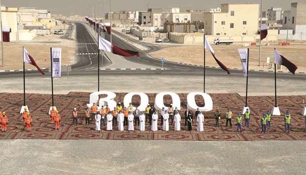 Ashghal officials and personnel marking the completion of the key infrastructure works.