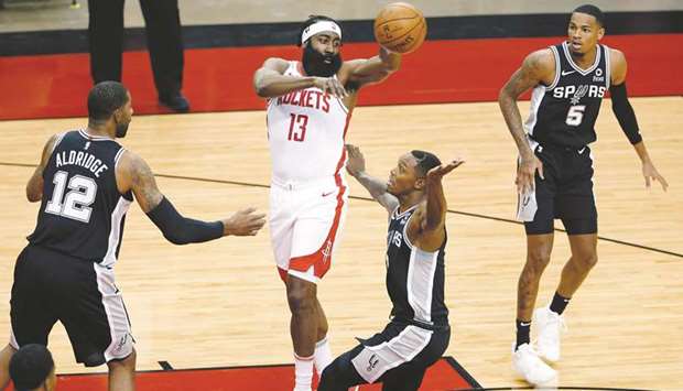 Houston Rockets guard James Harden (second from left) in action during the game against San Antonio Spurs in Houston, Texas, United States, on Tuesday. (USA TODAY Sports)
