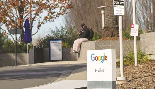 A man checks his mobile phone at an entrance to the Google campus in Mountain View, California. u201cGoogleu2019s anticompetitive actions have protected its general search monopolies and excluded rivals, depriving consumers of the benefits of competitive choices, forestalling innovation, and undermining new entry or expansion,u201d said Colorado attorney general Phil Weiser.