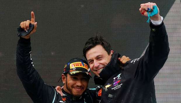 Mercedesu2019 Lewis Hamilton (L) with team principal Toto Wolff after winning the world championship in Istanbul last month.