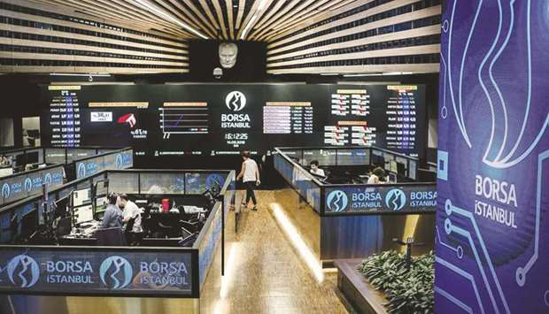 Employees work at the Borsa Istanbul stock exchange in Istanbul (file). Turkeyu2019s sovereign wealth fund is weighing an initial public offering of stock-exchange operator Borsa Istanbul within the next two years, chief executive officer Zafer Sonmez said in an interview with BloombergHT TV.