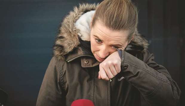 This picture taken last month shows Prime Minister Frederiksen after her visit to a closed and empty mink farm near Kolding, Denmark. Her government acknowledged that its decision to cull more than 15mn minks had no legal basis for those not