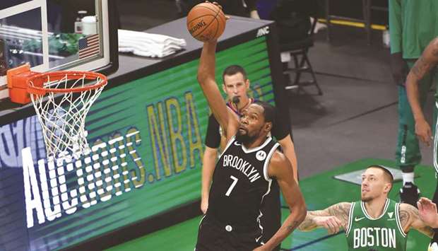 Brooklyn Netsu2019s Kevin Durant (7) drives to the basket during the game against Boston Celtics in Boston, United States, on Friday. (USA TODAY Sports)