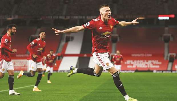 Manchester Unitedu2019s Scott McTominay celebrates after scoring against Leeds during the Premier League match in Manchester yesterday. (AFP)