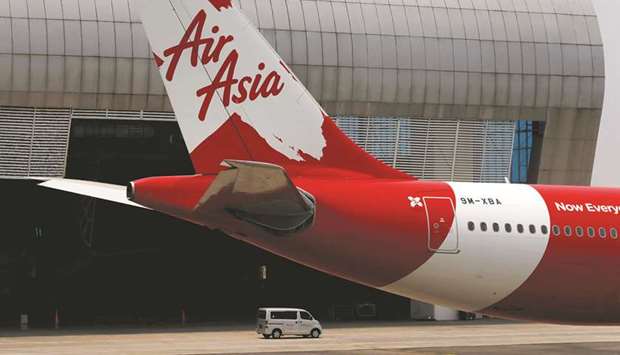 Tail of AirAsia X plane is seen at the Garuda Maintenance Facility AeroAsia in Tangerang, Indonesia. Airbus said it stands to lose more than $5bn worth of aircraft orders if AirAsia Xu2019s debt restructuring scheme goes through, court documents showed, joining more than a dozen creditors that have challenged the Malaysian low-budget carrieru2019s plan.