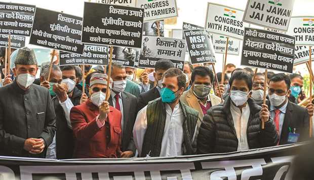 Opposition Congress party leader Rahul Gandhi (centre) along with his partyu2019s workers and members of parliament take part in a march towards the presidential palace u2018Rashtrapati Bhavanu2019 to request President Ram Nath Kovind to repeal the central governmentu2019s recent agricultural reforms in New Delhi, yesterday.