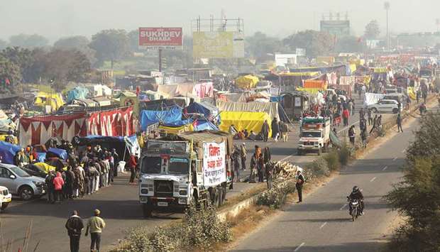 A view of a crowded highway as farmers protest against new farm laws at a state border in Shahjahanpur, in the desert state of Rajasthan, near New Delhi, yesterday.