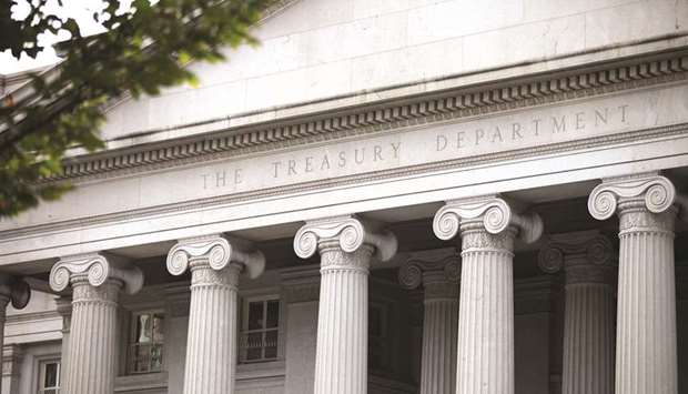 The Treasuryu2019s Pennsylvania Avenue entrance in Washington DC. Treasury traders are buzzing about 1% yields again, with all eyes on whether a massive slate of auctions this week and two key US Senate runoff elections in early January could get them there.