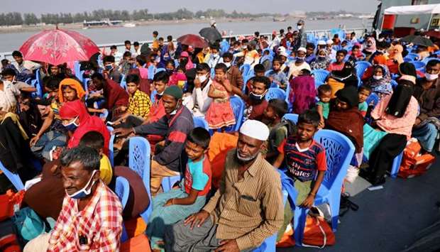 Rohingya refugees are seen aboard a ship as they are moved to Bhasan Char island in Chattogram, Bangladesh on December 4